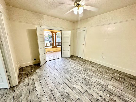 HUGE living room with double door entry to big bedroom #2 and double door entry to the spacious balcony.