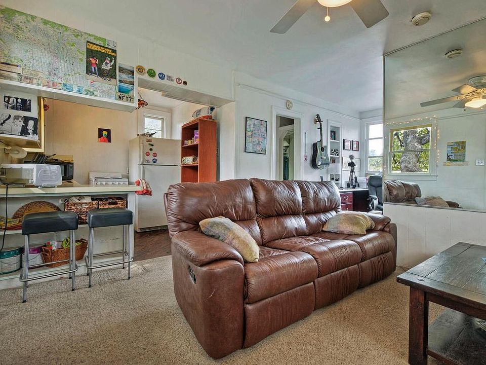Sunny living room and kitchenette