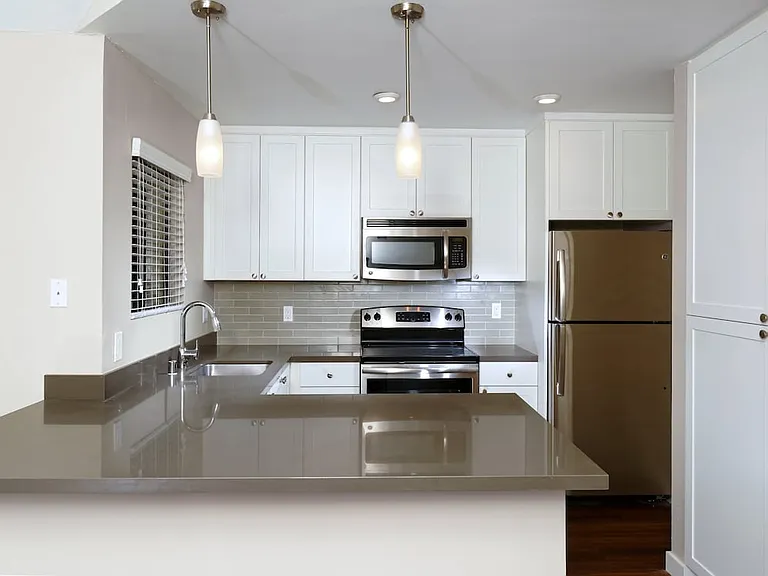 Kitchens With Quartz Countertops Tile Back Splash And Stainless Steel Appliances