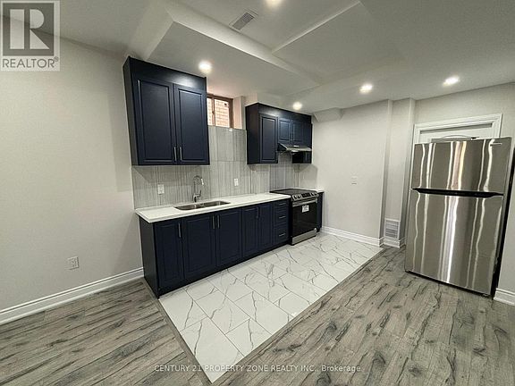 2nd image of 61 Hawtrey Rd #Basement