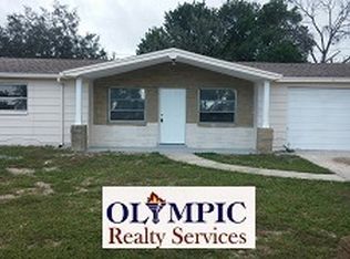 1446 Honor Dr, Holiday, FL 34690