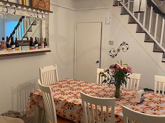 Dining room with open concept to living room