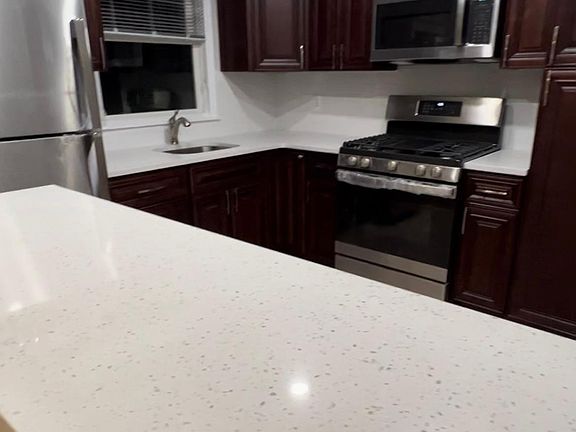 2nd image of 936 72nd St #2
