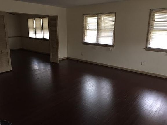 LIVING ROOM LOOKING INTO DINING ROOM