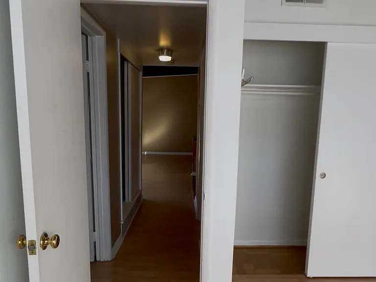 looking out to the hallway from second bedroom