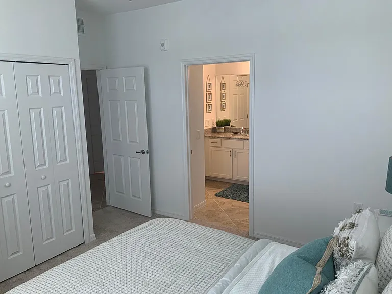 2nd bedroom with queen bed and full bath