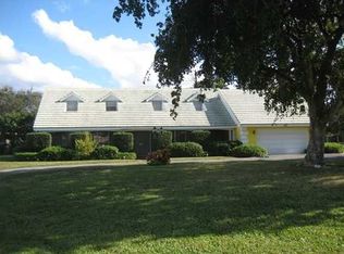 445 N Country Club Dr, Atlantis, FL 33462