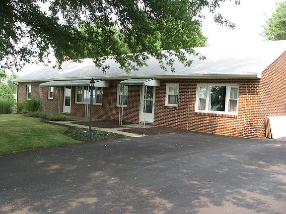 SIDE AND FRONT OF HOUSE