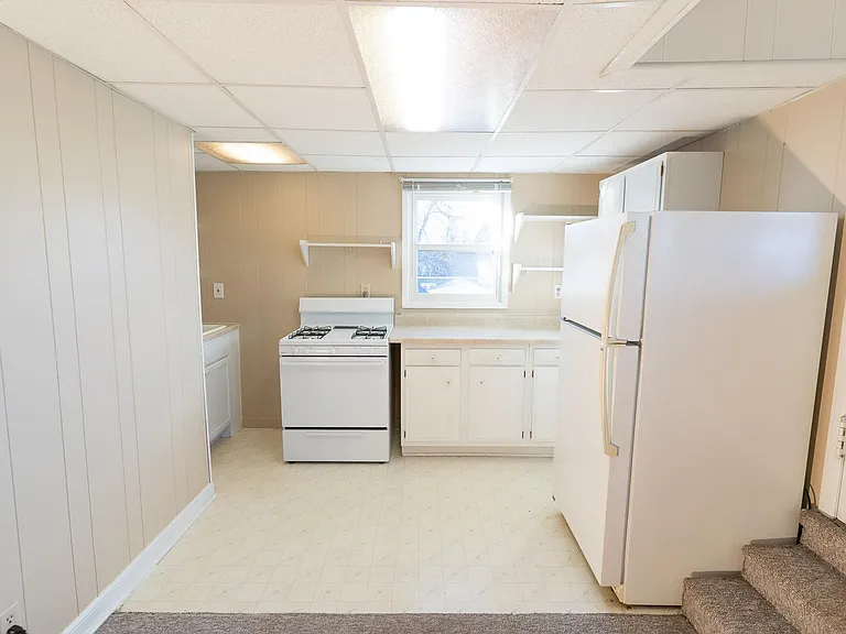 Kitchen of "mother-in-law" unit. Brand new fridge coming soon!