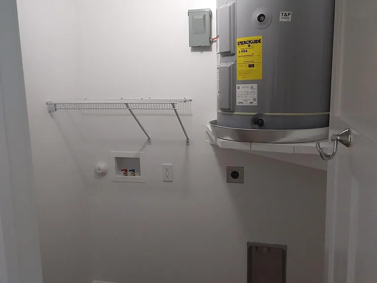 full-size washer & dryer hook-ups in hallway laundry closet