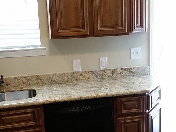 You can enter the from kitchen, that attached to the carport