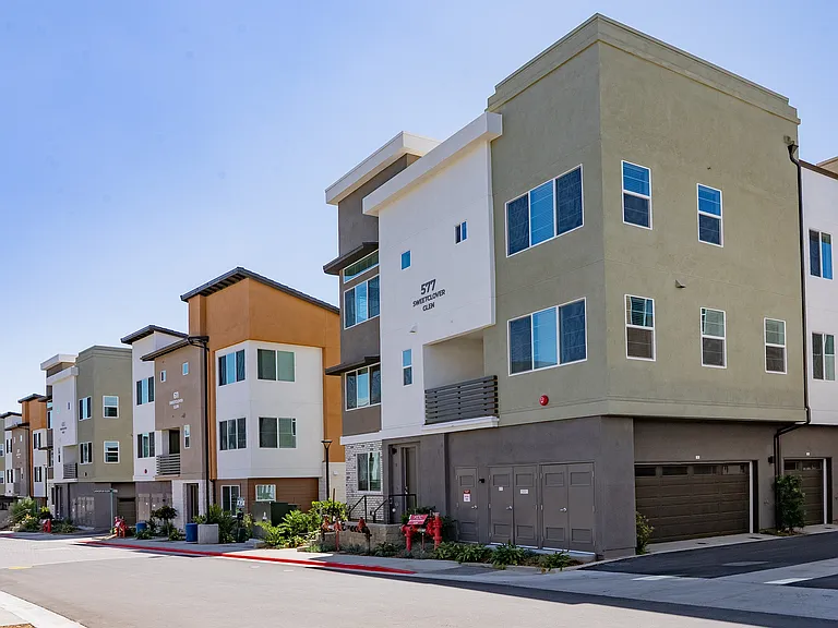 Modern Townhome Community with Spacious Balconies