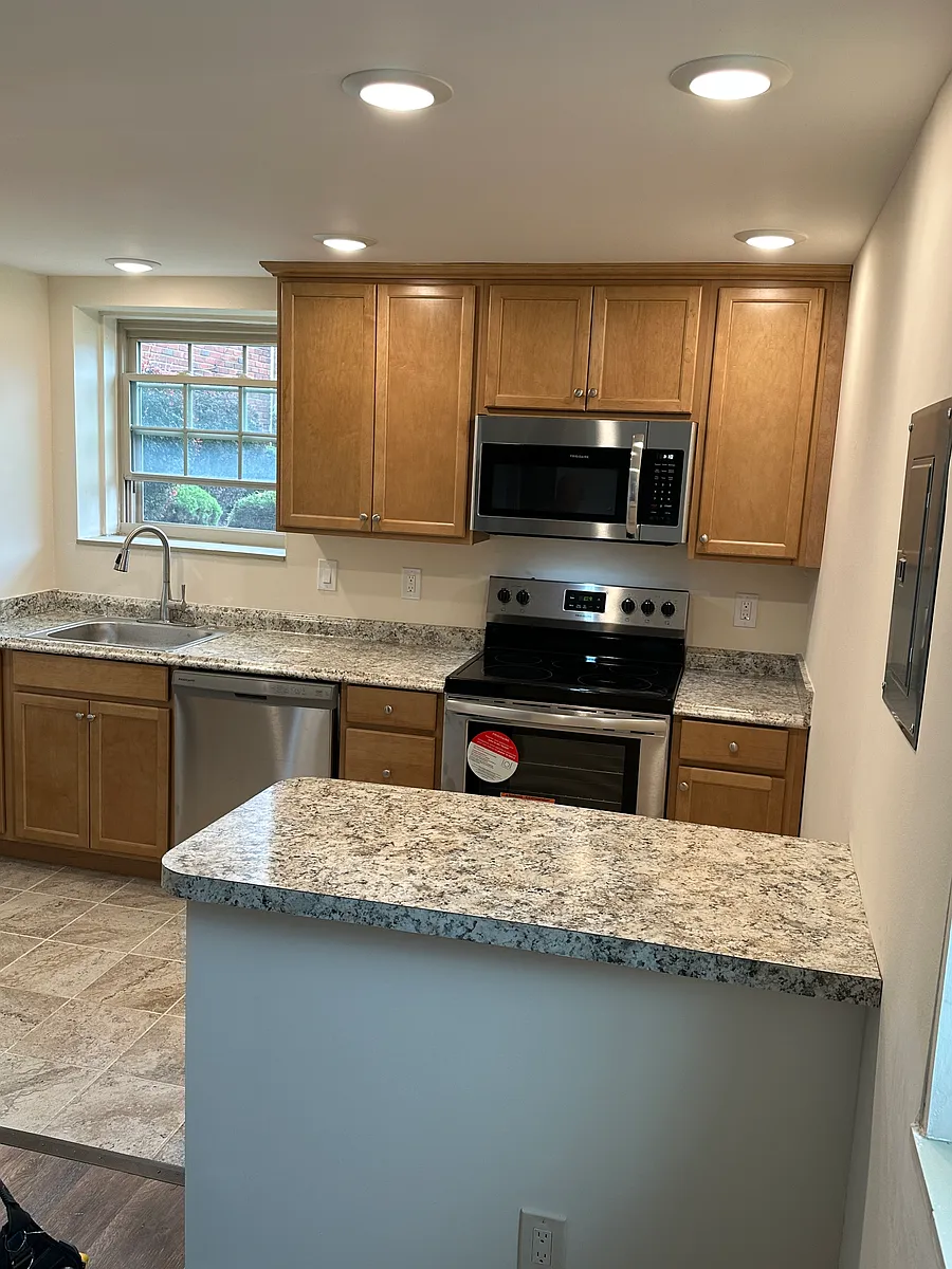 Building Photo - 68 Wehrle Dr #2