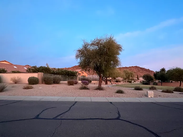 long greenbelt (grass) and sidewalk path behind home maintained by HOA