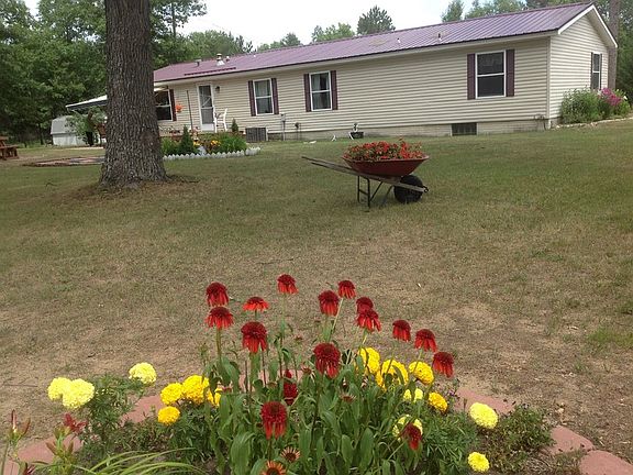 Back of home
						:
						Deck and patio for grill, table and chairs.
