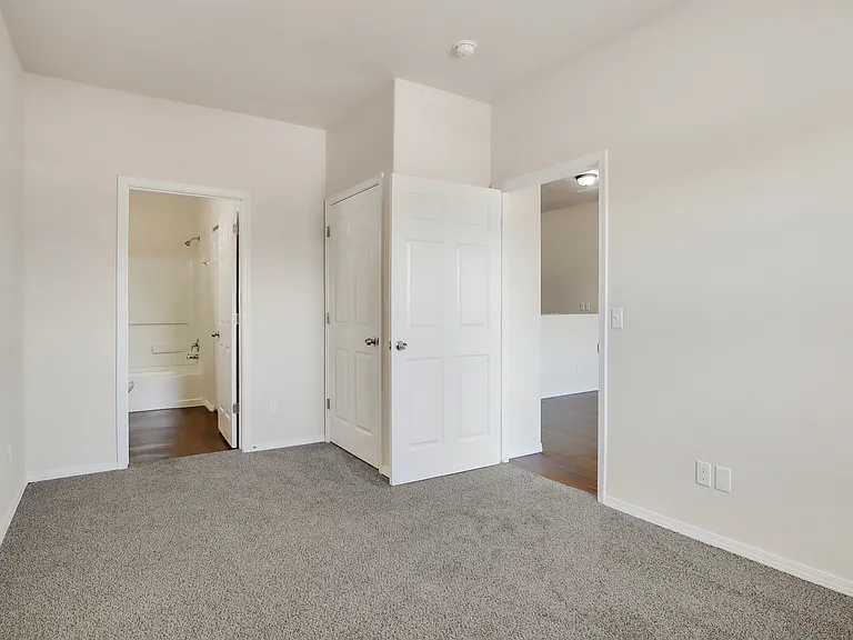 Unit 310 Bedroom has attached full bathroom