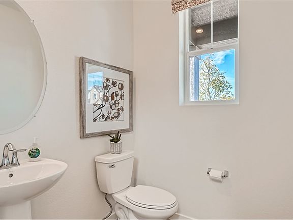A powder room off the foyer gives residents and guests convenient first-floor access.