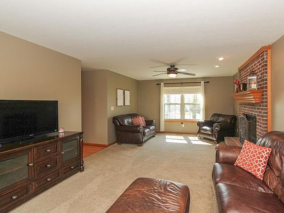 Large living room with brick fireplace!