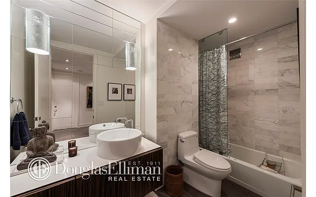 Sold by Douglas Elliman | media 11