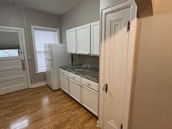 Kitchen cabinets and refrigerator