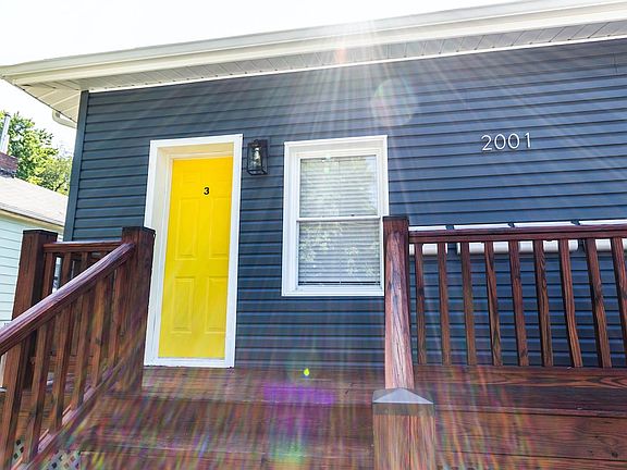 Exterior Newly Painted and Stained Front Deck