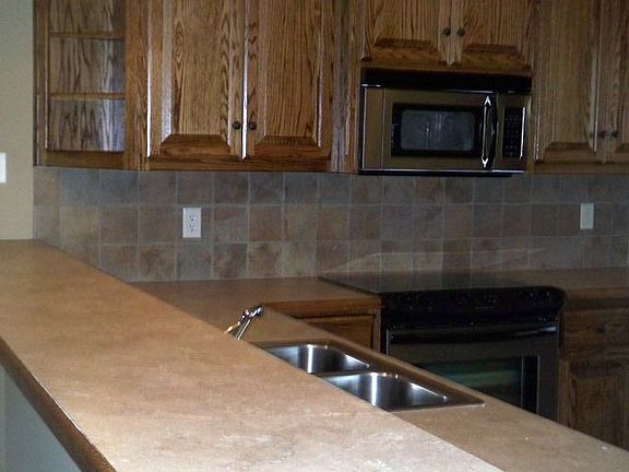 Kitchen with Custom Cabinets, Tile Backsplash 