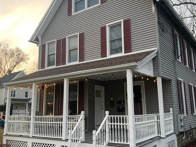 Front of the house with new front porch