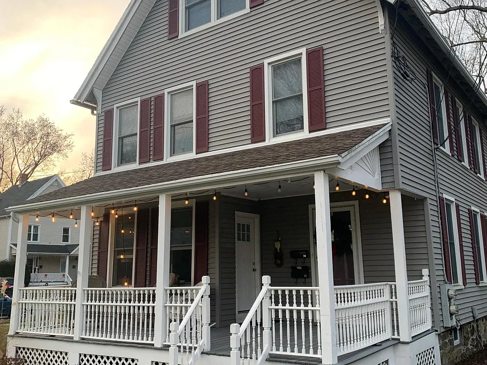 Front of the house with new front porch
