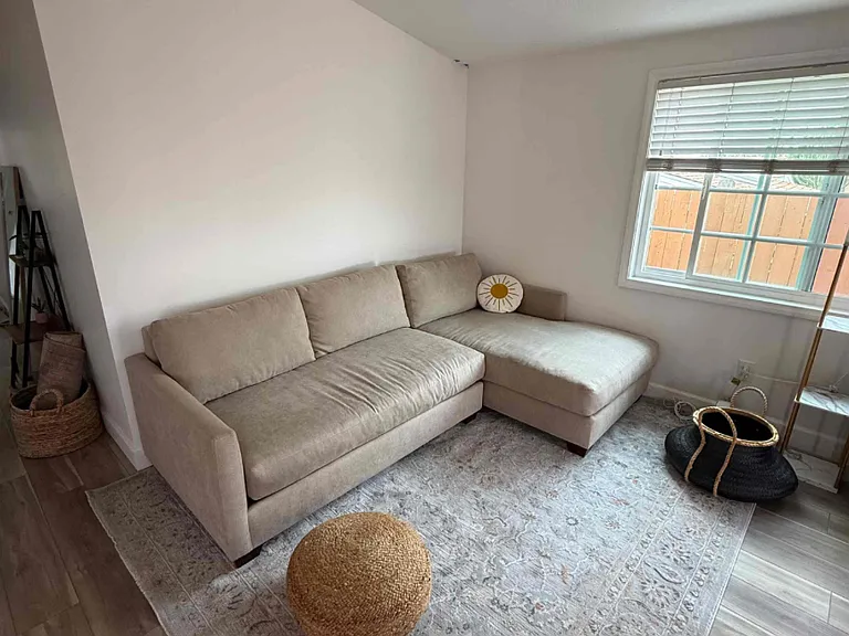 Reading/living room area well lit windows