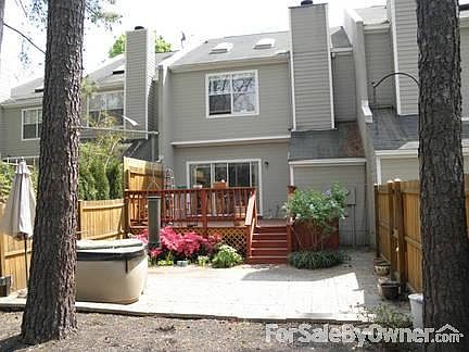 Rear View
						:
						Fenced lot deck and brick patio