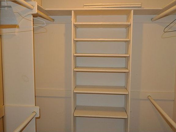 Waslking Closet In Master Bedroom