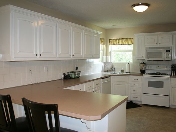 4th image of 21200 E 52nd Terrace Ct S