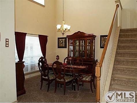 Two story space can be a formal dining, living, or office