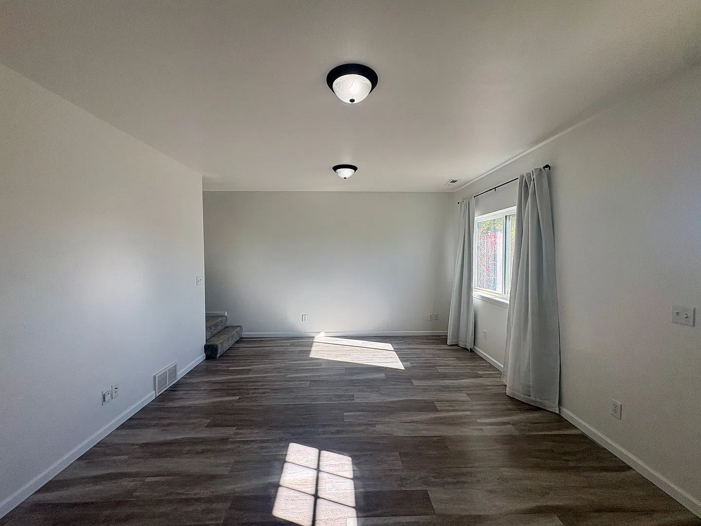 Spacious Updated 4-Bedroom, 2-Bathroom Home Near the Rims! — Photo 4