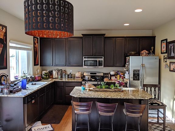 Kitchen with gas range.
