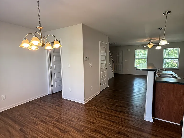 Photos of layout in similar unit. Overall finishes and fixtures may vary by home