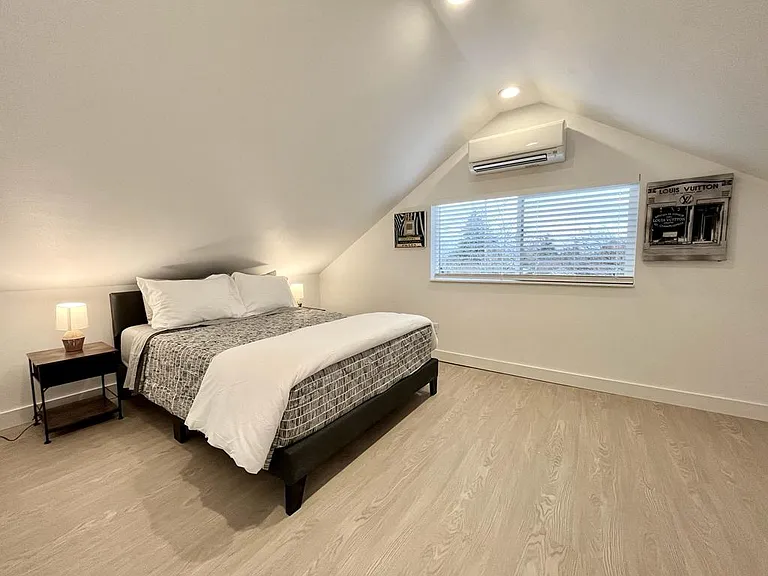 Sleep in style in our intimate and beautifully furnished upstairs 3rd bedroom with queen bed.