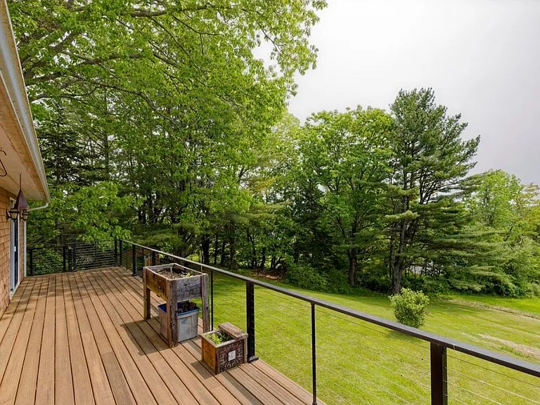 View of side/rear yard from Unit 1 deck