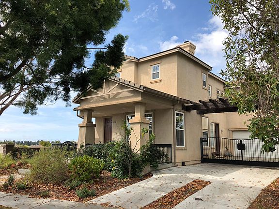 Large enclosed balcony with great view.