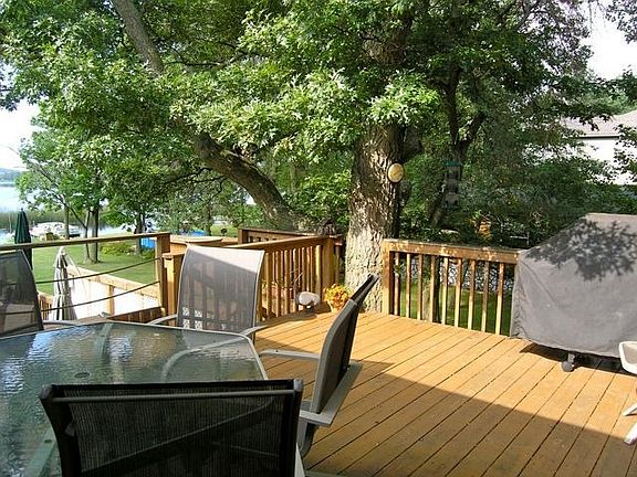 Upper deck with a huge red oak providing shade