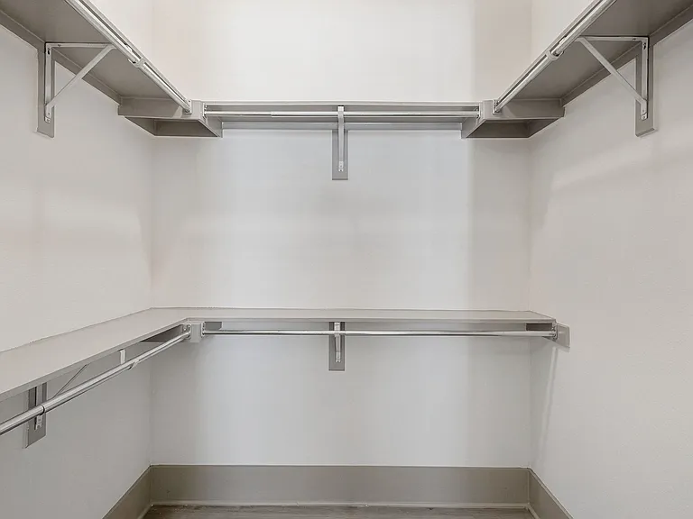 Closet with luxurious built-in shelving
