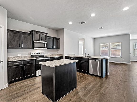 Photos shown here may not depict the specified home & features included are for illustration purposes only