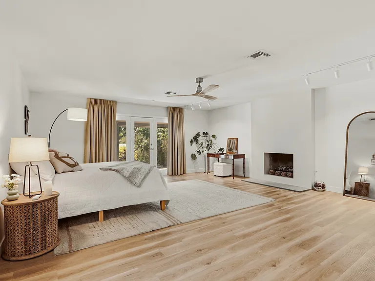 #GuardianRealty 3007 La Mesa Dr 1 story mid-centry modern henderson rental home luxury primary bedroom fireplace_07102026