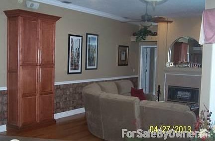 Light and bright family room
						:
						Hardwood floors, great fireplace, lots of built in storage!