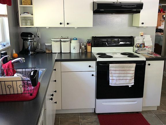 Range, dishwasher, refrigerator and garbage disposal included.. Basement has laundry hookup for electric washer and dryer.