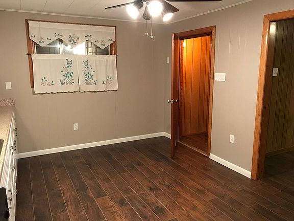 Kitchen looking into mud room, it connect to the living room also. Large windows.