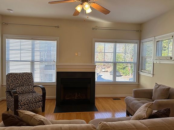 Family room with lots of windows.