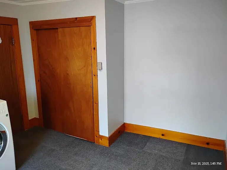 Full size closet for clothes storage, easy to store clothes only a few feet away from the dryer.