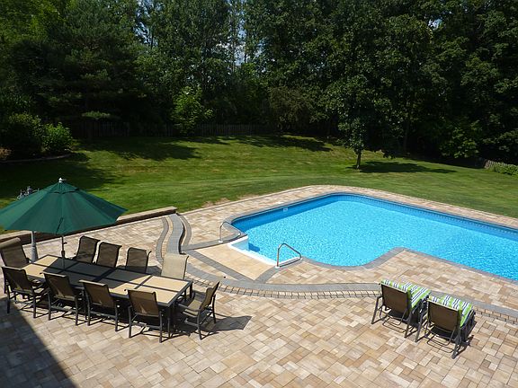 HUGE L shaped pool on patio