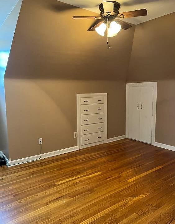 Bedroom with built in drawers, two spacious closets and an additional attic closet.